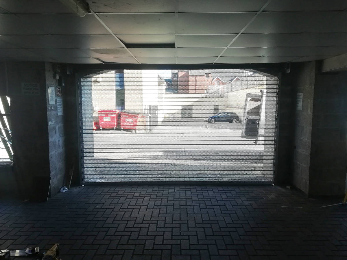Image of Perforated Security Door on Communal Garage in Newport